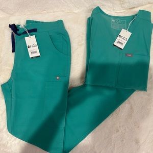 Teal Green Figs! Size small. Matching scrub top and bottoms both size small.